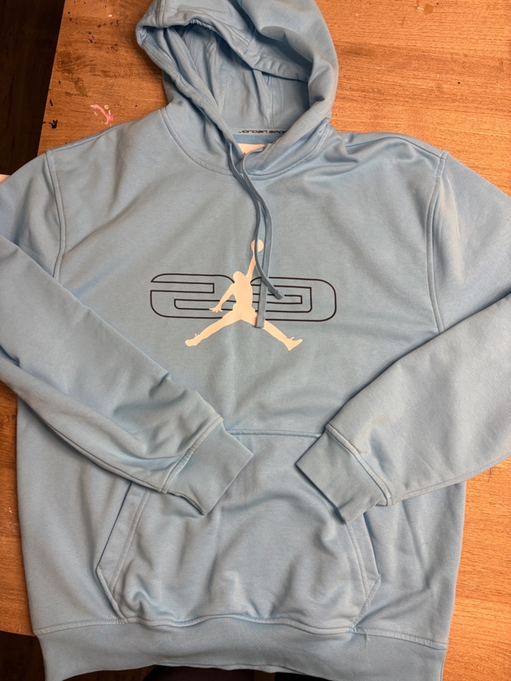 Jordan Light Blue Pullover Hoodie with White Jumpman and '23' Graphic